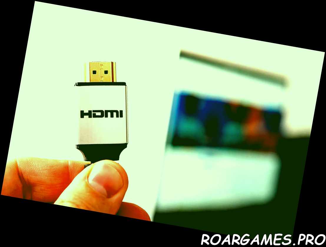Línea HDMI que conecta el sistema de audio y video de la computadora portátil al proyector