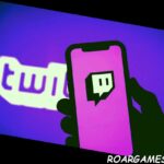 Logotipo de transmisión en vivo del juego Twitch en un teléfono inteligente